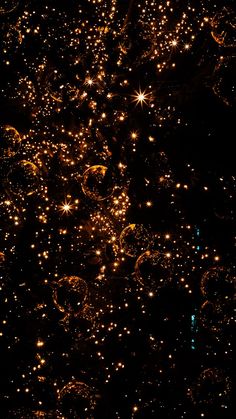 an image of bubbles in the air with sparkles on them and stars all around