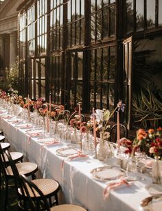 a long table is set up outside for an event