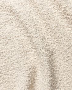 the texture of sand is white and beige