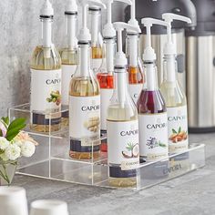 several bottles of soap and lotion sitting on a counter