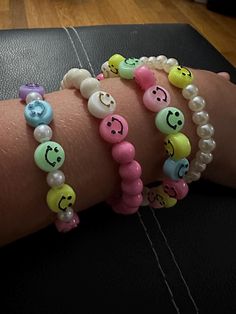 Smiley Beaded bracelet collection of 4 Affordable Cute Smiley Face Beaded Bracelets, Cute Beaded Stretch Bracelet, Trendy Bracelets With Colorful Beads, Trendy Assorted Colorful Beads Bracelets, Trendy Assorted Color Bracelets With Colorful Beads, Trendy Assorted Bracelets With Colorful Beads, Trendy Assorted Beaded Bracelets With Letter Beads, Trendy Assorted Round Bead Bracelets, Trendy Assorted Round Beads Bracelets