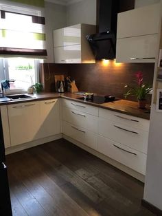 the kitchen is clean and ready for us to use in its new owner's home