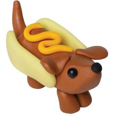 a toy hot dog with mustard and ketchup on it's buns