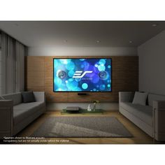 a large flat screen tv mounted to the side of a wall in a living room