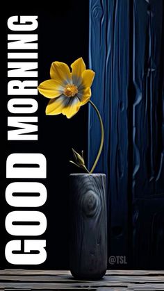 a yellow flower in a black vase with the words'good morning'on it