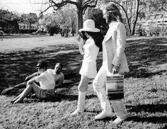 black and white photograph of two women in the park