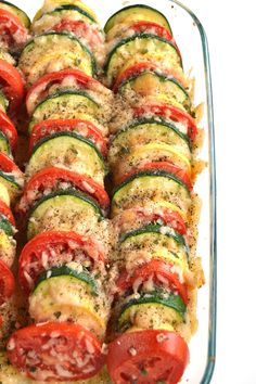 a glass dish filled with sliced up veggies