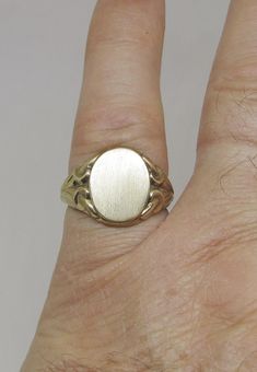 A fine example of Art Nouveau is this 14Kt yellow solid gold classic men's signet ring. The oval top measures 12 X 15 millimeters. The ring is a size 10 and it can easily be sized. Classic Oval Cabochon Rings Stamped 14k, Formal Yellow Gold Signet Ring With Oval Cabochon, Formal 14k Gold Oval Cabochon Signet Ring, 14k Gold Oval Cabochon Signet Ring For Formal Occasions, Classic Yellow Gold Signet Ring With Oval Cabochon, Classic Yellow Gold Oval Cabochon Signet Ring, Formal Hallmarked Oval Cabochon Signet Ring, Classic Oval Signet Ring Stamped 14k, Classic Oval Engraved Ring For Formal Occasions