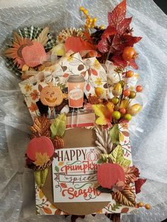 an autumn card made with paper and crafting supplies