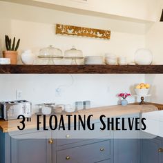 three floating shelves above a kitchen counter with bowls and plates on it, along with the words 3 floating shelves