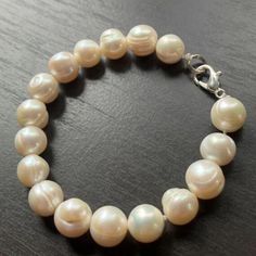 Hand Knotted 9 mm White Freshwater Pearls Bracelet, 7 inches, Silver tone Pearl White Oyster Bracelet, White Oyster Bracelet, Golden Co, Pearls Bracelet, Freshwater Pearl Bracelet, White Freshwater Pearl, Pearl Bracelet, Fresh Water, Freshwater Pearls