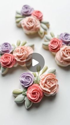 some pink and purple flowers are on a white surface with the words, how to make polymer roses