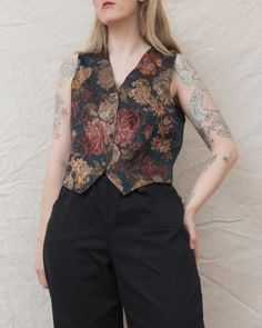 [we smell the flowers like they will never die]Vintage floral brocade vest, Perfect to wear as a top by itself. •Gorgeous floral brocade in the front•Dark green semi sheer fabric in the back•Sleeveless•Oversized fit•Buttons in the front LABEL: DIANE K. - Made in USACONDITION: Vintage / ExcellentSIZE: fits S/MErika is 5'10" and a size S in tops + M/L in bottoms. Please make sure to double check your measurements with the ones listed in the tab below. Brocade Vest, Floral Vest, Floral Vests, Fabulous Clothes, Vintage Vest, Vest Outfits, Down Vest, Sheer Fabric, Vintage Button