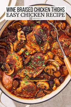 a pan filled with chicken thighs and mushrooms on top of a white countertop