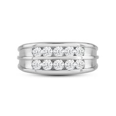 a white gold ring with three rows of diamonds