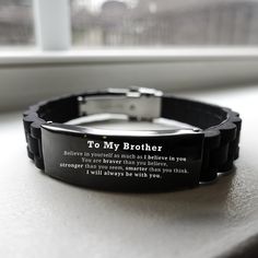 Our Handmade Engraved Stainless-Steel Bracelet transcends style and sentiment and epitomizes thoughtful gifting. Crafted to perfection, this bracelet captures the essence of Brother, making it an exquisite gift choice for all occasions. Message reads: Believe in yourself as much as I believe in you. You are braver than you believe, stronger than seem, smarter than you think I will always be with Personalized Connection: Tailored for Brother, our bracelet carries a message that speaks to the heart. Whether it's Valentine's Day, Father's Day, Thanksgiving, Christmas, birthdays, or anniversaries. this gift is a universal symbol of your love and appreciation. Artisanal Masterpiece: Immerse yourself in handcrafted perfection. Meticulously designed by skilled artisans, this bracelet showcases in Black Inspirational Friendship Bracelets, Inspirational Black Friendship Bracelets, Black Bracelets With Engraving Option For Gift, Personalized Inspirational Black Bracelets, Inspirational Personalized Black Bracelets, Gifts Brother, Christmas Gifts For Brother, Brother Brother, Brother Gifts