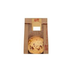 a chocolate chip cookie in a brown paper bag on a white background with the label