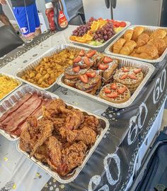 several trays of food on a table