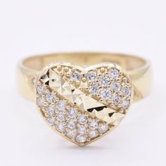 "Women's Textured Heart CZ Engagement Ring Real Solid 10K Yellow Gold * Metal : Real 10K Yellow Gold (Properly Stamped, 10K) * Condition : Brand New * Finish : Polished * Average Weight : 3.37 grams * Length : 11.5mm = Just under 1/2\" * Width : 4mm * Clasp/Bail : Size 8 All of our items are brand new and are shipped with a gift box." 14k Stamped Heart Cut Promise Jewelry, Heart Cut 14k Stamped Promise Jewelry, Stamped 14k Heart Cut Promise Jewelry, Heart Cut 14k Jewelry For Promise, Heart-shaped Diamond Cut Promise Jewelry, Heart-shaped Diamond Cut Jewelry For Promise, Promise Jewelry With Heart-shaped Diamond Cut, Promise Heart-shaped Diamond Cut Jewelry, Gold Grillz