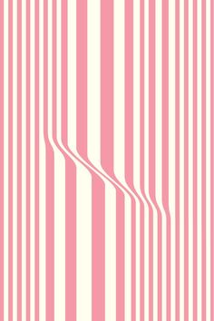 a pink and white striped wallpaper with vertical lines