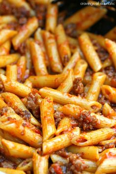 pasta with meat and sauce in a pan