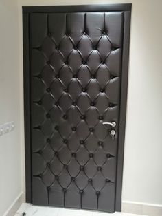 the door is made out of black leather