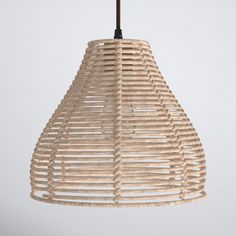 a wooden light hanging from a ceiling