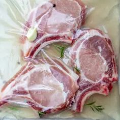 three raw meats are wrapped in plastic