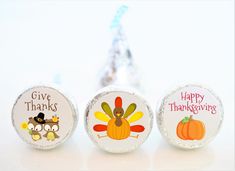 three glass magnets with thanksgiving designs on them and an owl, turkey, and pumpkin