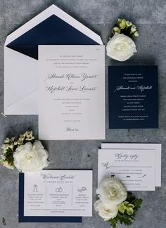 the wedding stationery was done in navy and white