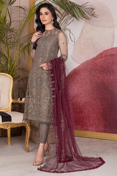 Brown Pakistani Kameez in Capri Style Party Wear is Crafted on a luscious canvas in a light brown base representing elegant work of art, this ensemble is a vision to praise. It comes paired with a beautifully designed contrasting dupatta in the shade of maroon giving it an enhanced aura. It is additionally accentuated by a heavy neckline & borders complemented by an embellished chiffon dupatta & dyed trousers. Detailed Description: SKU: PB0036 Detailing: Embroidery, Threads, Floral designs Color Pakistani Kameez, Net Shirt, Shades Of Maroon, Pakistani Boutique, Capri Style, Eid Dresses, Pakistani Designers, 3 Piece Suits, Fashion Consultant