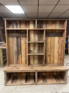 a large wooden shelf with shelves on it