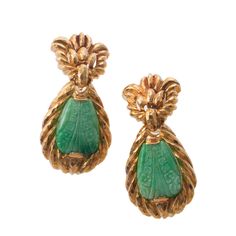 Pair of 18k gold drop earring by David Webb, with carved jade. DESIGNER: David Webb MATERIAL: 18k Gold GEMSTONES: Jade DIMENSIONS: Earrings are 49mm x 24mm. MARKED/TESTED: Webb, 18k. WEIGHT: 45 grams. CONDITION: Previously Owned, Excellent Condition. Luxury Carved Earrings For Formal Occasions, Elegant Carved Earrings For Formal Occasions, Formal Carved Yellow Gold Earrings, Carved Yellow Gold Earrings For Formal Occasions, Elegant Carved Drop Earrings, Elegant Carved Yellow Gold Earrings, Formal Carved Gold Earrings, Formal Gold Carved Earrings, Luxury Jade Earrings For Formal Occasions