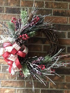 a christmas wreath on a brick wall