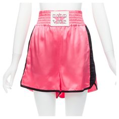 CHRISTIAN DIOR 2022 Dior Vibe pink satin black panels boxing shorts XS Reference: AAWC/A00494 Brand: Dior Designer: Maria Grazia Chiuri Collection: 2022 Dior Vibe Material: Viscose Color: Pink, Black Pattern: Solid Closure: Elasticated Extra Details: Elasticated waist. Made in: Italy CONDITION: Condition: Excellent, this item was pre-owned and is in excellent condition. Comes with: Style code present (Generic) SIZING Designer size: XS Size reference: US2-4 / UK8 / IT40 / FR36 / XS-S MEASUREMENTS: Waist: 30cm / 11.7" Hip: 46cm / 17.9" Rise: 38cm / 14.8" In leg: 7cm / 2.7" Length: 38cm / 14.8" Leg opening: 33cm / 12.9" This Dior item is authentic. Christian Dior 2022, Vibe Pink, Dior 2022, Christian Dior Designer, Boxing Shorts, Dior Designer, Maria Grazia Chiuri, Maria Grazia, Black Panels