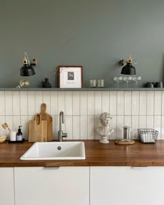 the kitchen counter is clean and ready to be used as a work space for cooking