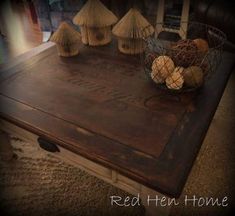 a wooden table topped with lots of mushrooms