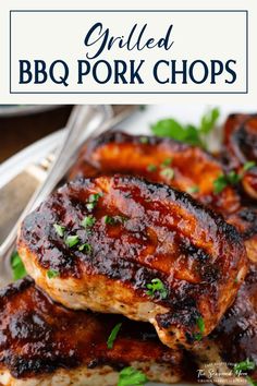 grilled bbq pork chops on a white plate