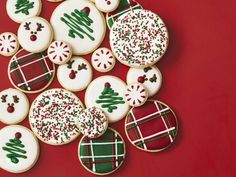 decorated christmas cookies on a red background