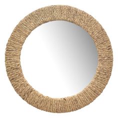 a round mirror that is made out of straw