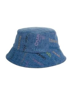 From the 2022 Collection. Blue and multicolor Chanel denim bucket hat with logo print throughout. Designer size M. Trendy Blue Flat Brim Bucket Hat, Summer Hats With Logo And Curved Brim, Blue Bucket Hat For Summer, Summer Cotton Hats With Logo Print, Summer Cotton Hat With Logo Print, Blue Bucket Hat With Flat Brim For Spring, Spring Hats With Logo Print And Curved Brim, Trendy Curved Brim Hat With Logo, Trendy Letter Print Bucket Hat