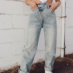 Asymmetrical denim pants Size and Fit: Model height 5’2” wearing size 24 Runs large- consider sizing down Asymmetrical Jeans, Western Style Outfits, Model Height, Western Fashion, Denim Pants, Boutique Clothing, Mom Jeans, Outfit Inspirations, Fashion Outfits