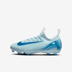 a white and blue nike soccer shoe on a white background with the word nike written in blue