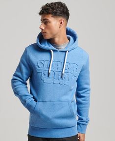 Show off that you're a part of our Superdry family in a fresh spin on classic comfort. This soft hoodie features our iconic brand in a stylish embossed style, and is a great go-to for those casual days. Relaxed fit – the classic Superdry fit. Not too slim, not too loose, just right. Go for your normal size Drawcord-adjustable hood Embossed graphic Ribbed cuffs Front pouch pocket Brushed lining Signature Superdry tab Hooded Jumper, Men's Sweatshirts, Soft Hoodie, Blue Hoodie, Mens Sweatshirts Hoodie, Bright Blue, Emboss, Pocket Pouch, Vintage Men