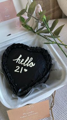 a heart shaped cake sitting on top of a table