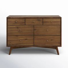 the chest of drawers is made from wood and has six drawers on one side, with two