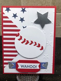 a close up of a baseball card with stars and stripes on the back, which reads wahoo