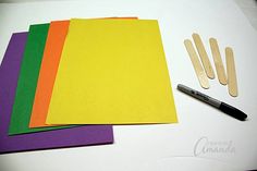 several pieces of paper are laid out on a table