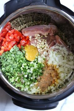 the ingredients for this meal are mixed together in an instant pressure cooker, ready to be cooked