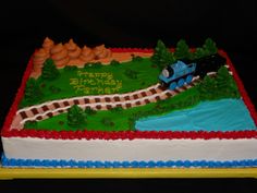 a birthday cake with a train on it